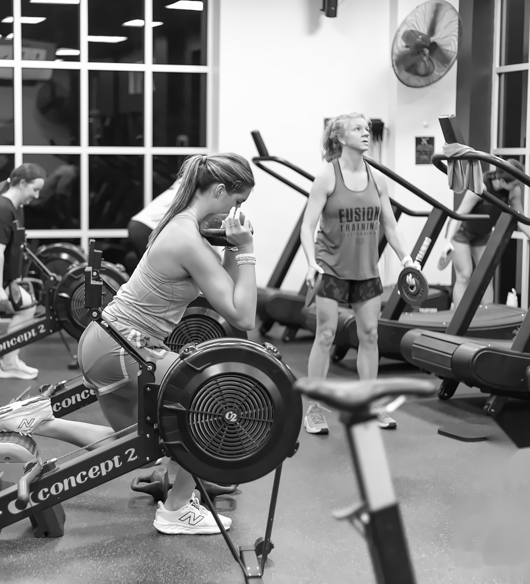 X4 members training together in a coach-led group class